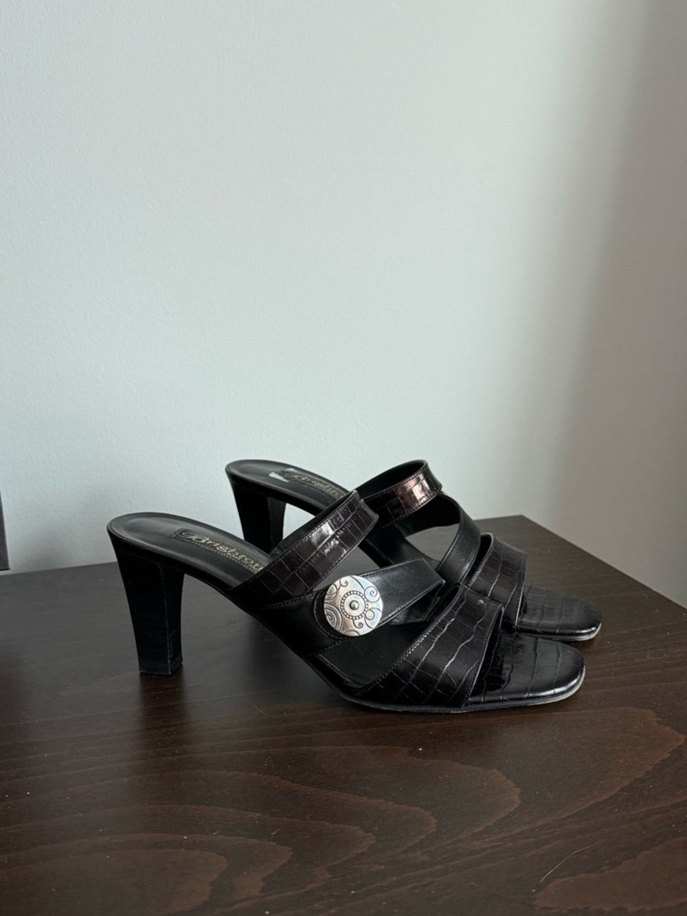 Brighton Black Croc-Embossed Heeled Slide Mules with Silver Medallion